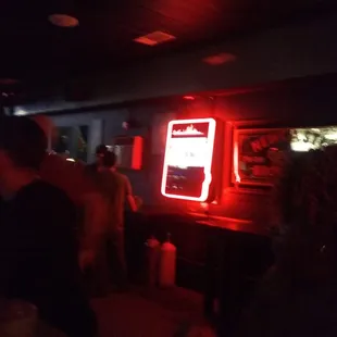 a group of people in a bar