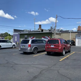 two cars parked in a parking lot