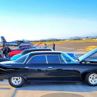 a black car with its hood open