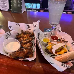 two baskets of food on a bar