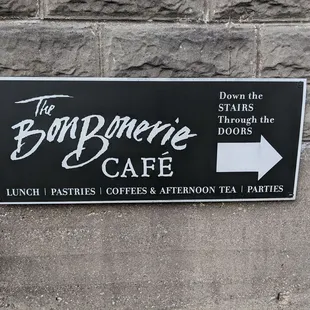 a sign for a cafe