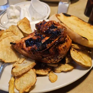1/4 white bbq chicken with cottage fries and garlic bread