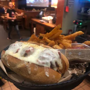 a hot dog and french fries