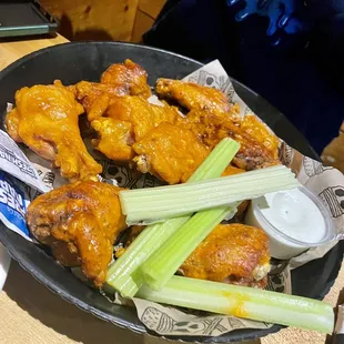 Bone in Traditional Wings, food was mediocre.  Service was the slowest we have had in awhile.