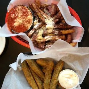 Eggplant Parmesan and fried pickles. Healthy treat. Lol
