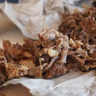 a piece of meat on a piece of paper