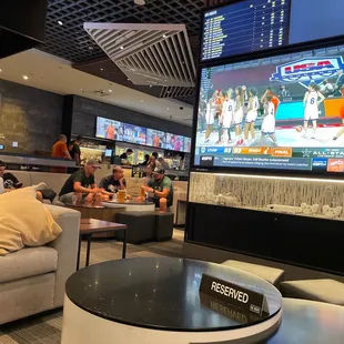 a large television in a sports bar