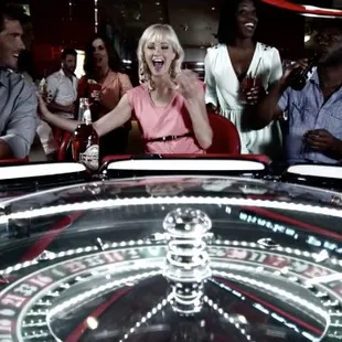 a group of people in a casino