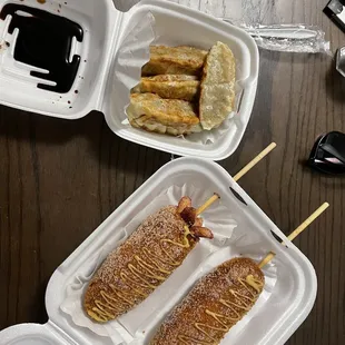 two trays of food on a table