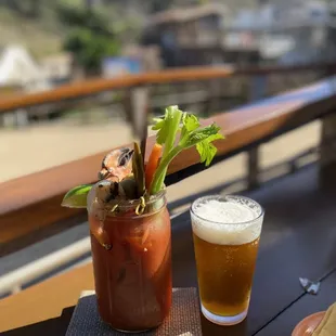 a bloody drink and a glass of beer