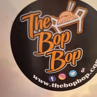 a sticker on a toilet seat