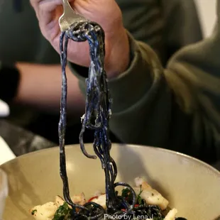 Spaghetti Nero ($33) - squid ink pasta, shrimp, manila clams, fresno chili, parsley, fennel cream