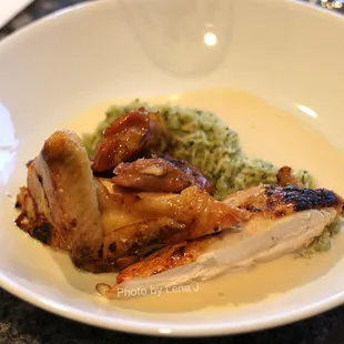 Brown Butter Glazed Half Amish Chicken ($42) - ramp pesto, lava bean, sauce supreme, basmati rice