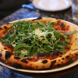 Garlic Pizza ($20) - garlic cloves, Castelvetrano olives, arugula, pecorino