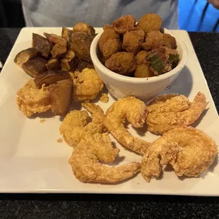 Fried shrimp with fried okra and fried garlic potatoes