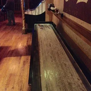 They do have a shuffleboard table