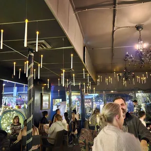 a group of people sitting at tables