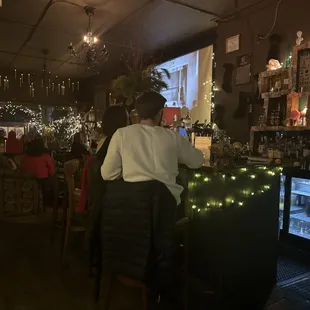 The bar and you can see the movie screen and tables from this angle.