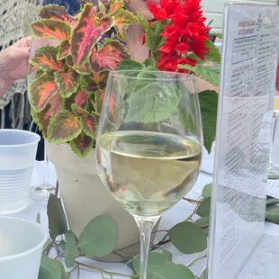 a woman smelling a glass of wine