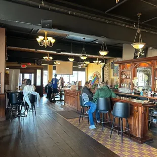 people sitting at the bar