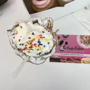 a cupcake and a box of cupcakes