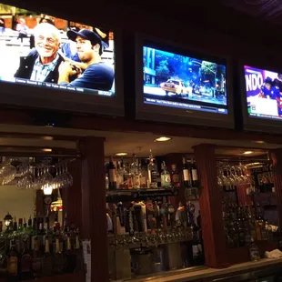 two televisions above the bar