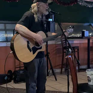 a man playing a guitar