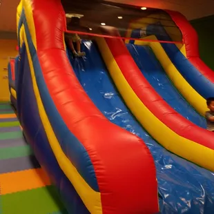 Giant slide, which requires going through am obstacle course!