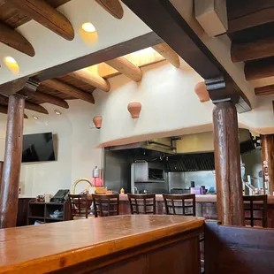 a view of the bar and kitchen