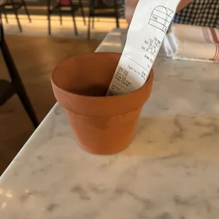 The check came in a cute flower pot