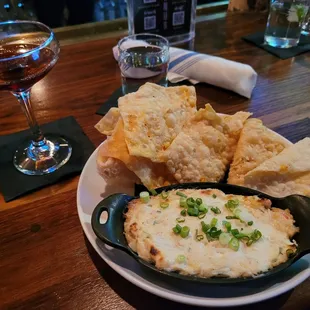 Crab rangoon dip and a black manhattan