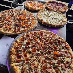 2 Xtra Large The Butcher, Large Lava Luau, Medium Pepperoni, and Large Supreme