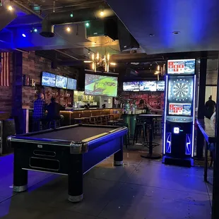 Part of the main room where the bar is. See how many TVs there are, JUST in front of the bar??!! There are others as well!!