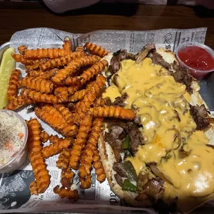 Philly Cheese Philly Cheesesteak Sandwich with sweet potato fries