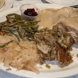 The Gobbler Thanksgiving special. Roast turkey breast, gravy, mashed potatoes, dressing, green bean casserole, sauerkraut, cranberry sauce.