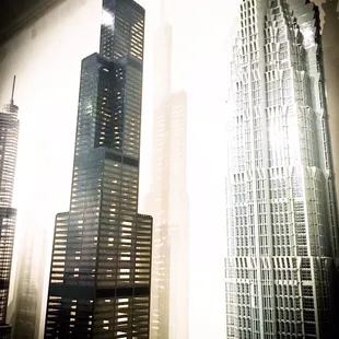 Skyscrapers taller than me constructed of LEGOs in a free exhibit in downtown Kansas City Missouri.