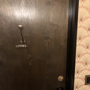 Coat hanger in bathroom