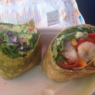 a wrap with shrimp and vegetables