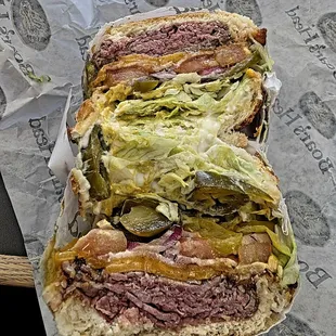 The City Boy- London broil Roast beef, cheddar, bacon and bbq sauce. Toasted.