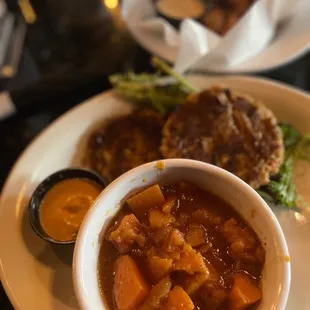 Sweet potatoes and wings that are out of focus