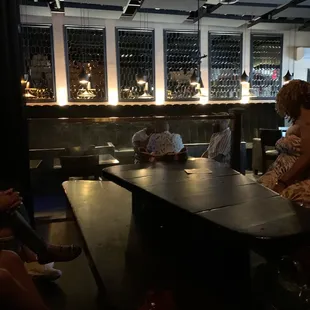 people sitting at the bar