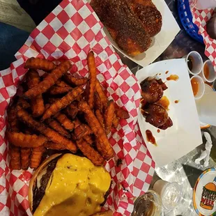 Au jus you serious burger w/ sweet potatoes fries and marshmallows dip in the background you can see the bacon wrapped meatballs &amp; egg roll