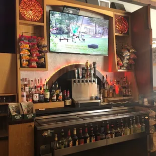 a bar with a flat screen tv