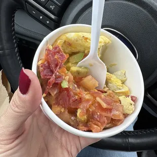 This is so fresh and delicious made hot to order for me... eggs, bacon, cheese, avocado, and tomato. Perfect for protein diets!