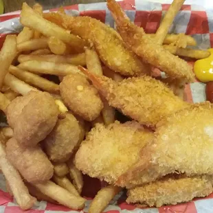 Shrimp bakset, brew city fries, and a few cheese balls from my boyfriends plate.