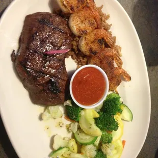 The 10 oz sirloin and grilled Cajun shrimp.
