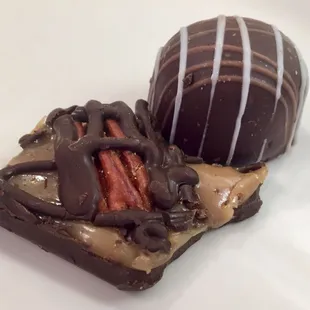 STALE EXPENSIVE CHOCOLATES: triple chocolate truffle, dark chocolate pecan bark: $8.75.