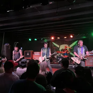 a band performing on stage