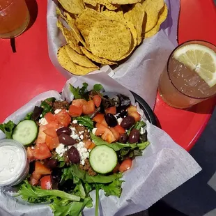 Greek Salad sub tortillas chips with beyond crumbles.