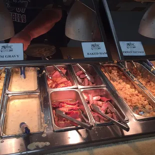 a buffet of different types of food